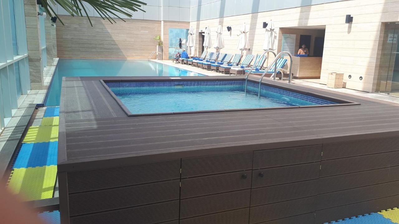 Royal M Hotel Fujairah By Gewan Экстерьер фото The swimming pool at the hotel
